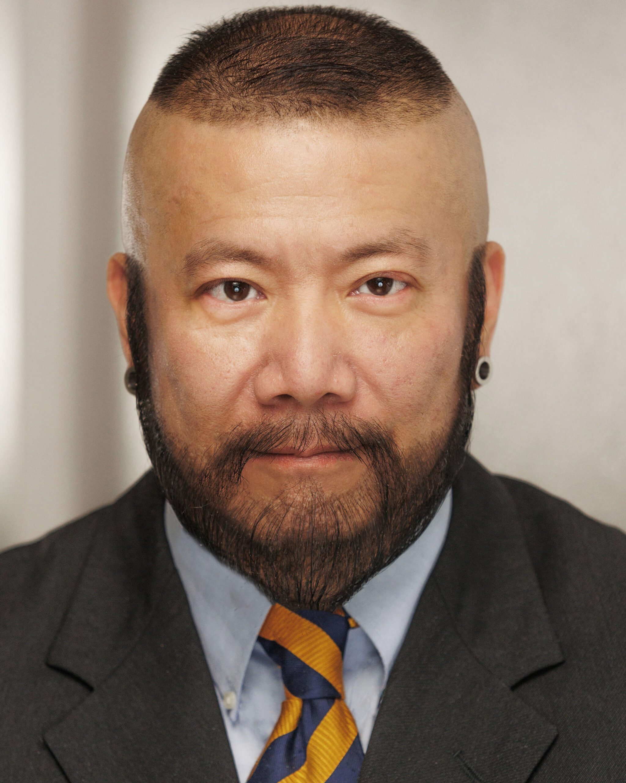 Headshot: Suit Smile