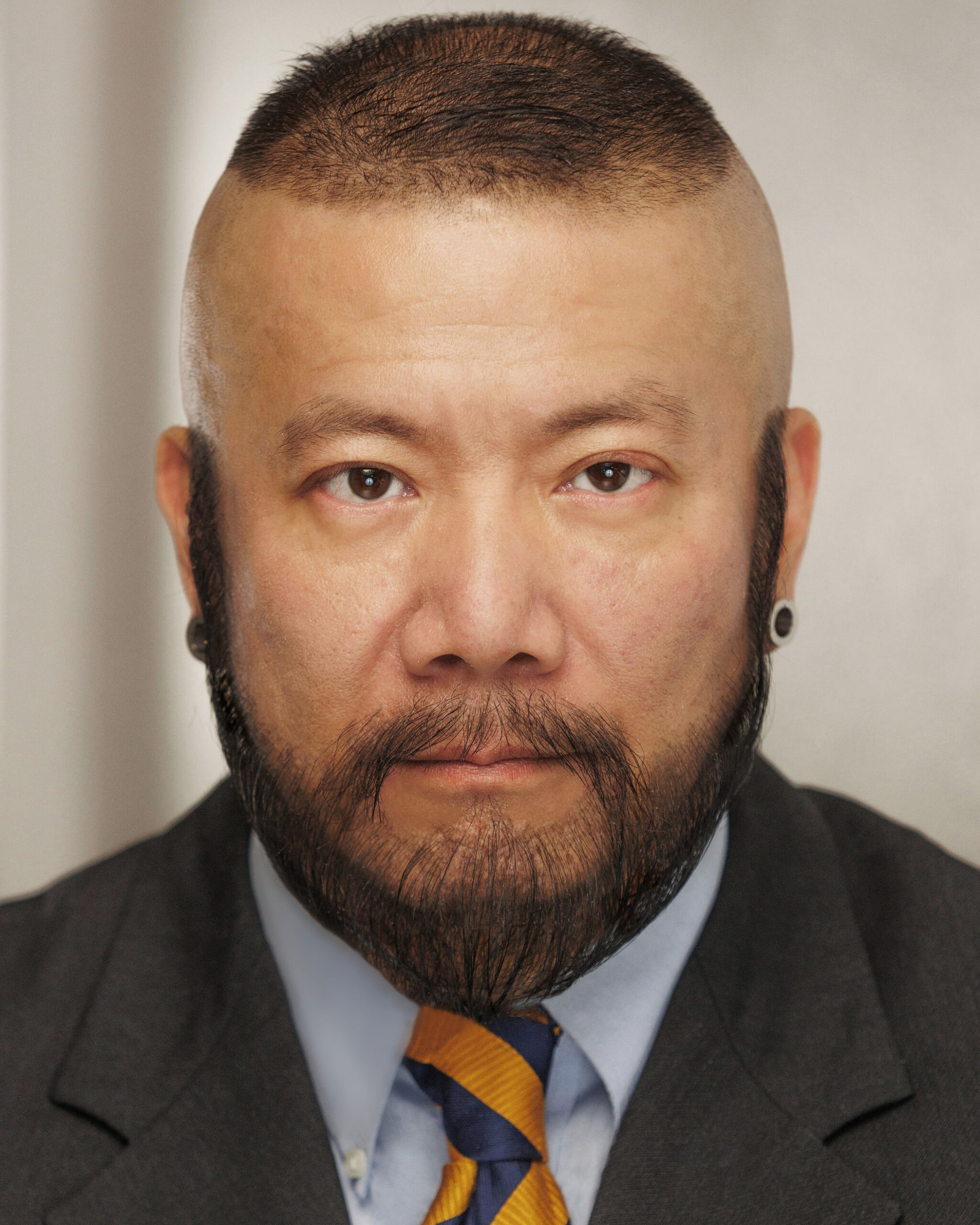 Harry Konner's Headshot: Suit Serious