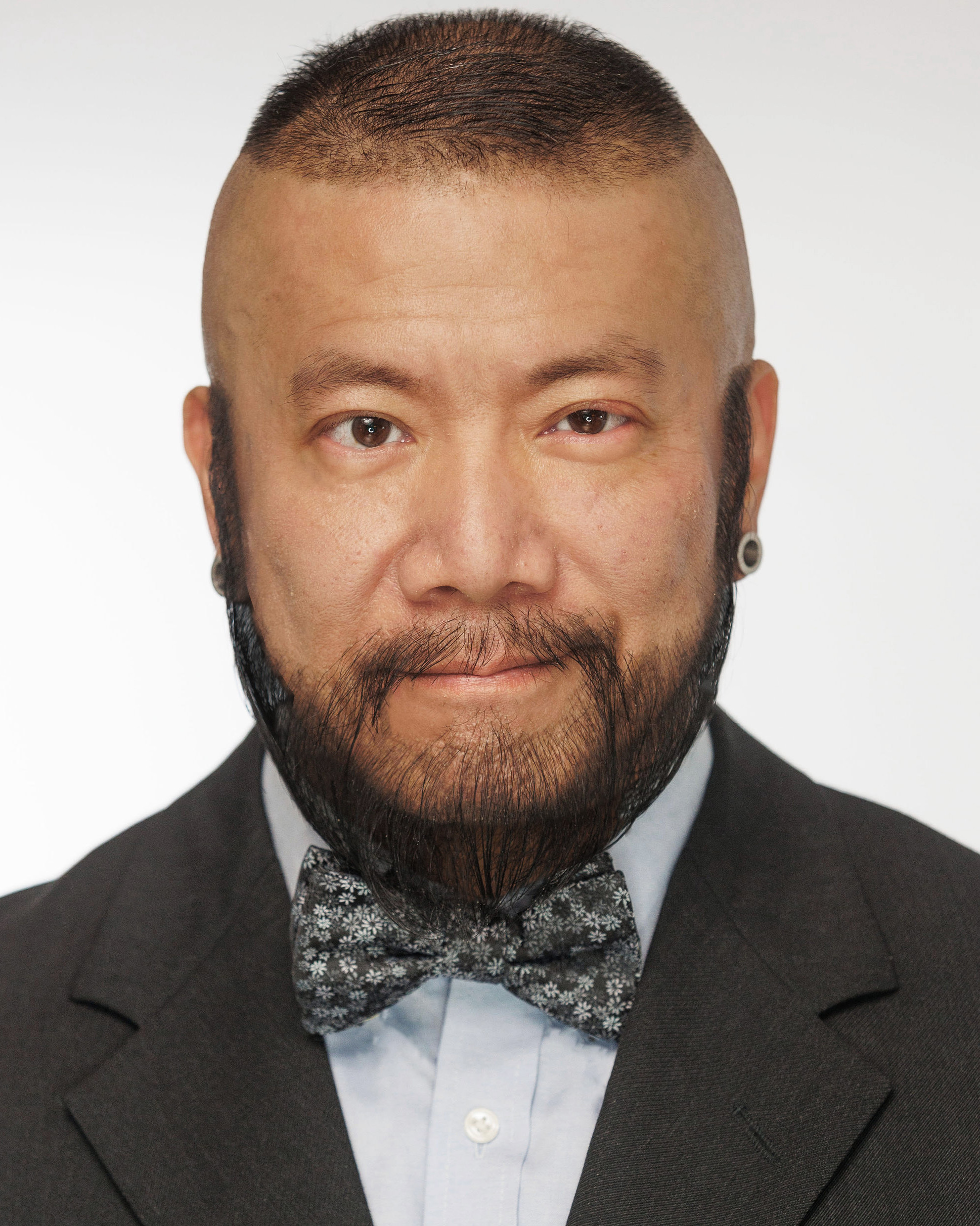 Harry Konner's Headshot: Bow Tie - Slight Wink