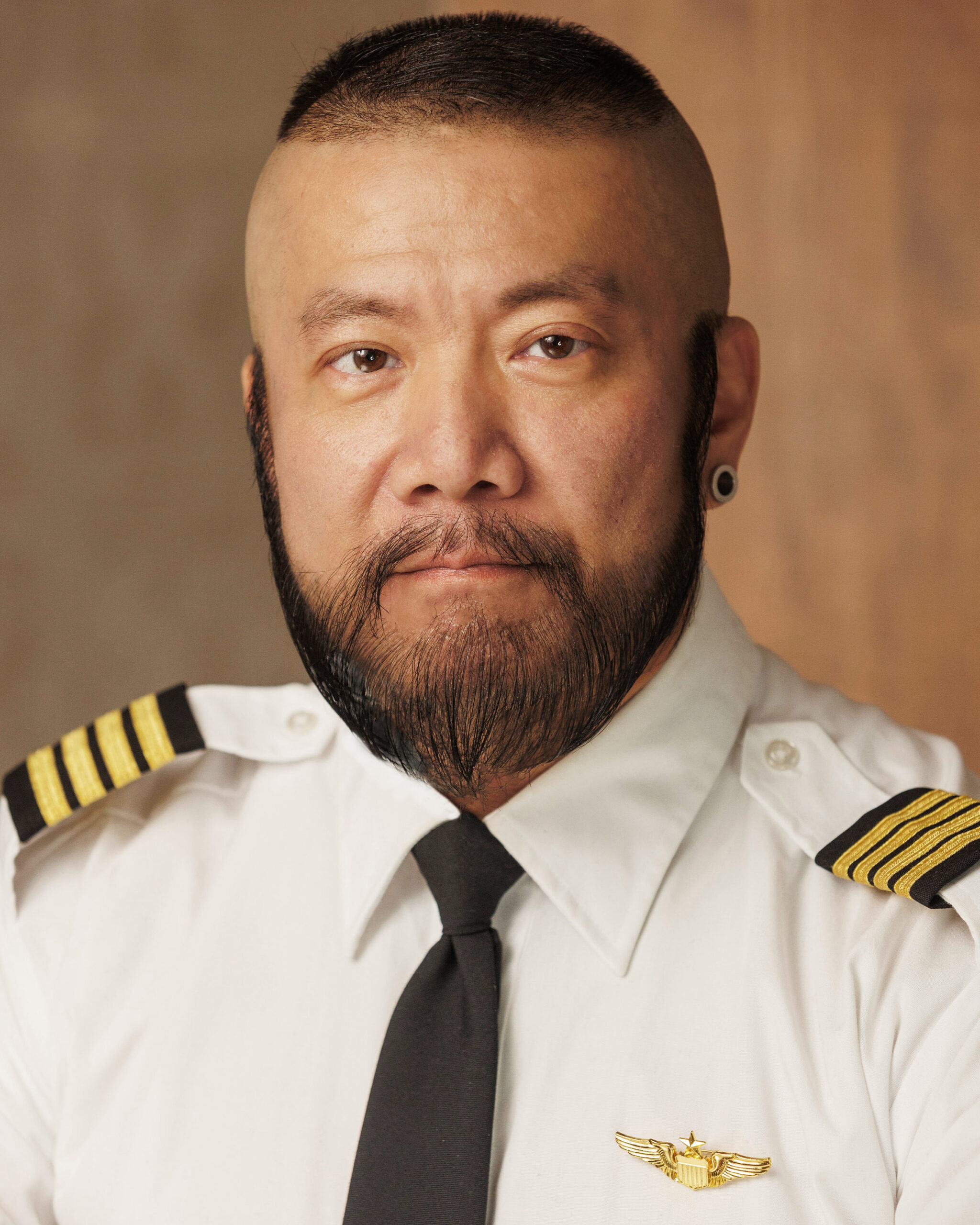 Harry Konner's Headshot: Airline Pilot - Side Gaze Staff Directory Style