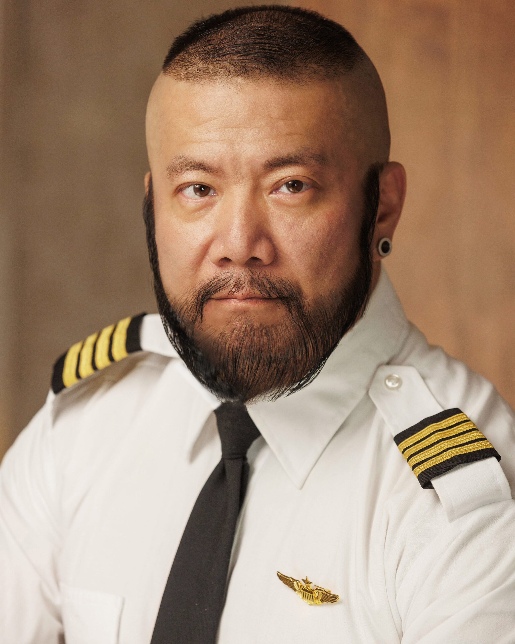 Harry Konner's Headshot: Airline Pilot - Side Gaze